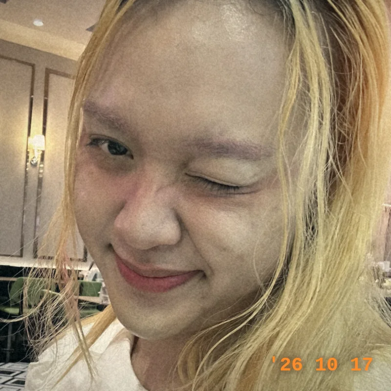 Korn winking at a cafe